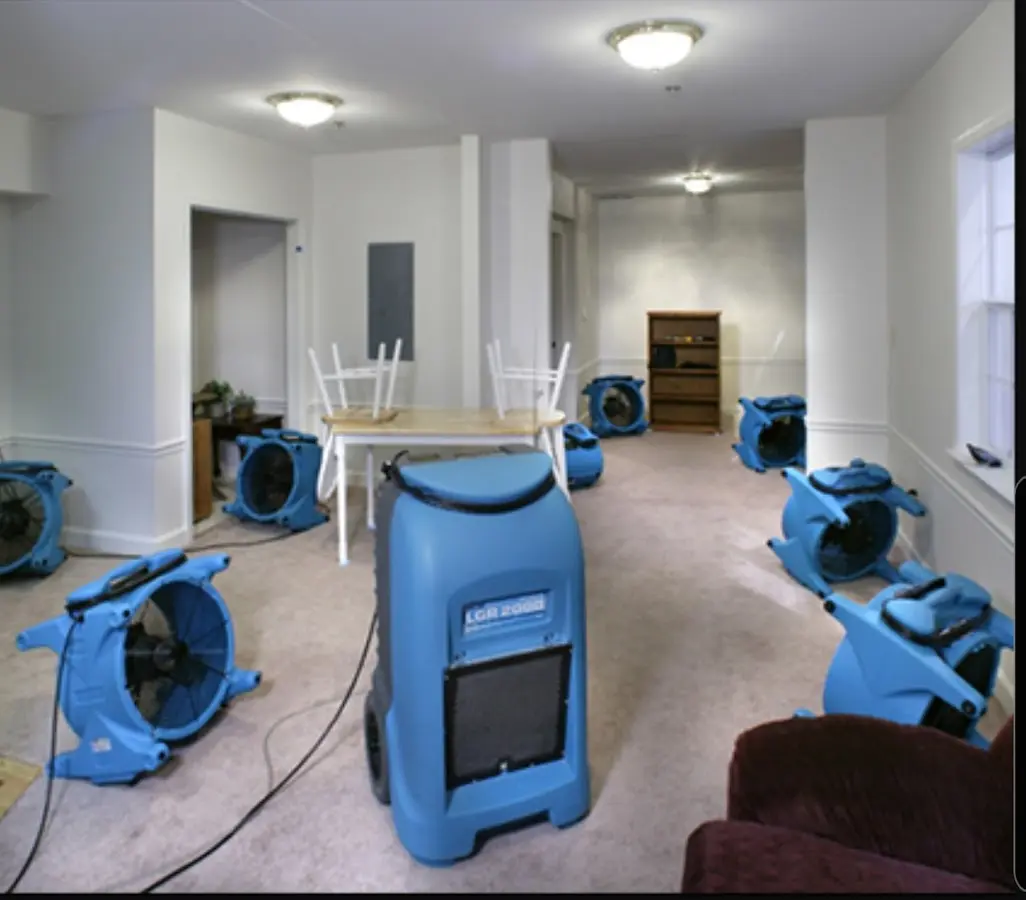 Air movers and dehumidifier setup for Water Damage Restoration in Portsmouth